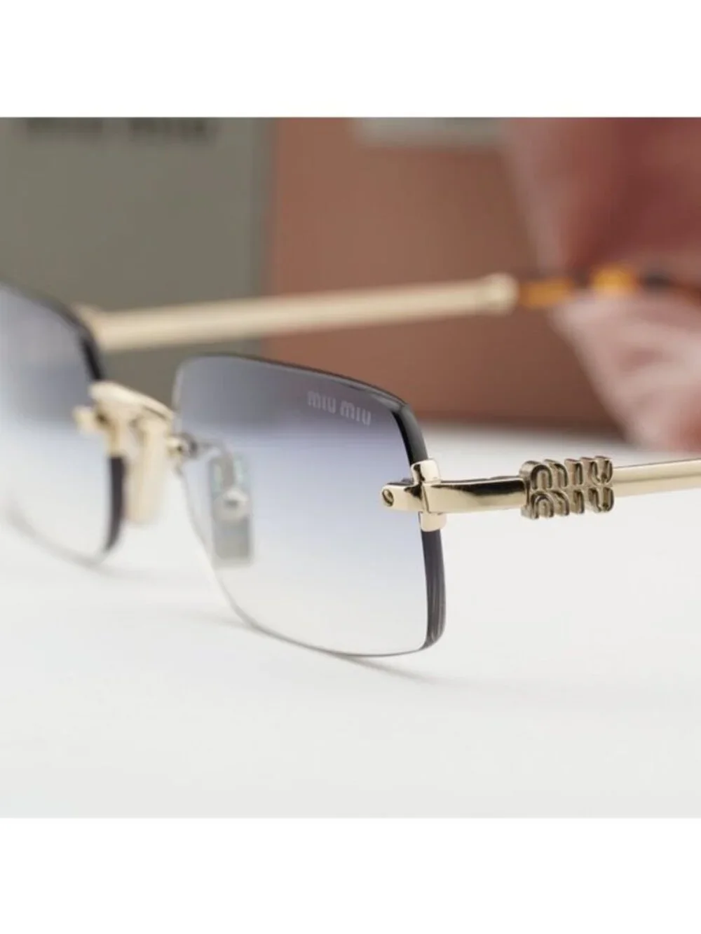 Miu Miu MUB50S ZVN80O Rectangle Sunglasses – Gold/Light Blue